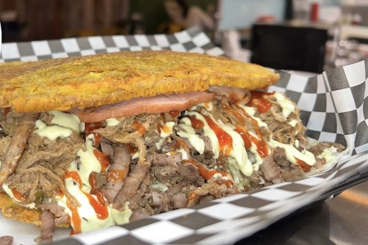 The restaurant prides itself on authentic Venezuelan dishes and includes a variety of sandwiches and hamburgers. (Courtesy of Code 58)