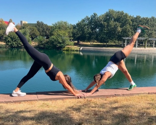 Two women in yoga poses