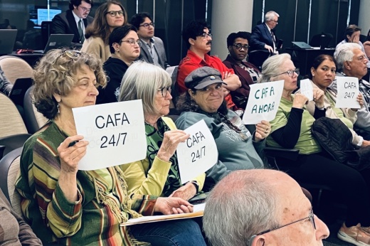 Members from a civil rights advocacy group Austin Sanctuary Network vocalized their desire for Counsel at First Appearance in Travis County during Commissioners Court on Jan. 28. (Haley McLeod/Community Impact)