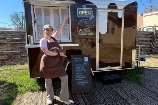 An image of the owner of the business with the truck.