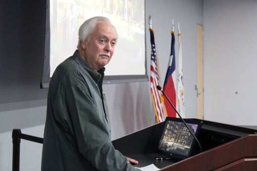 A man speaking at a podium