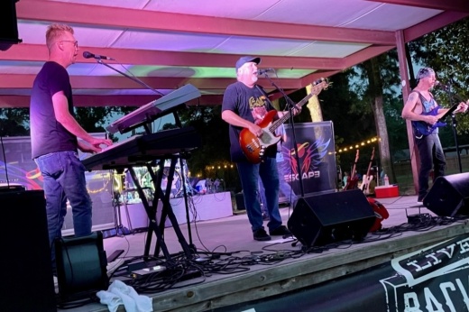 This photo shows a live concert at Back Pew Brewing