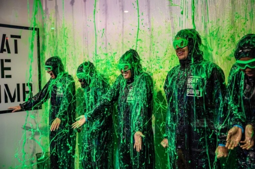 A photo of game participants getting slime bombed