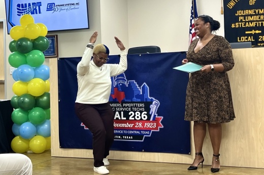 Texas Construction Career Pathways graduate Kadija Johnson celebrates completing 120 hours of training, paving the way for a trade apprenticeship. (Haley McLeod/Community Impact)