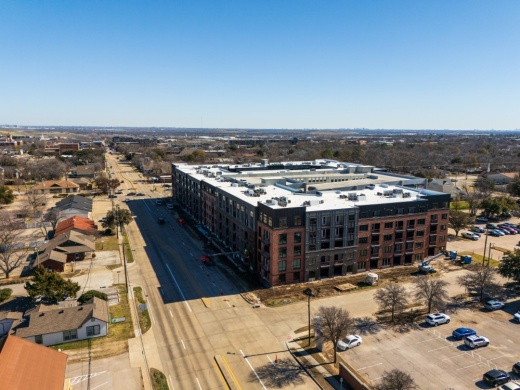 A drone shot of Aura Main Street, which is surrounded by other Old Town Lewisville development.
