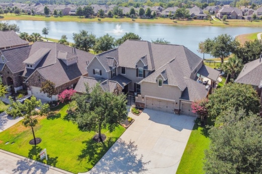 A drone photo of homes in the Gleannloch Farms neighborhood