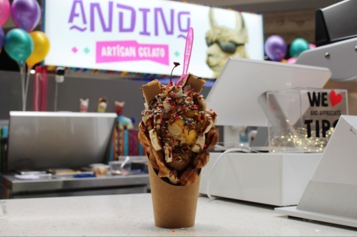 A bubble cone ($11.20-$12.20) allows customers to choose up to three gelato flavors and toppings plus a sweet sauce to put in a soft waffle cone. (Sarah Hernandez/Community Impact)