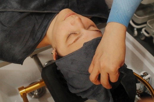 A person getting a face massage