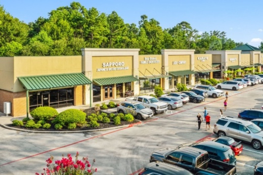Shopping center with parking lot