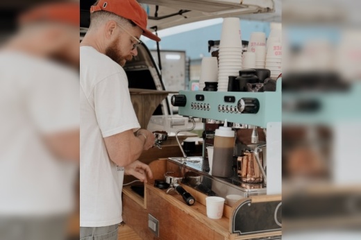 Kyoko owner Patrick Lyle operates one of North Austin's newest coffee shop out of a retrofitted, brightly painted minivan. (Courtesy Jinchufoto/Kyoko Coffee)