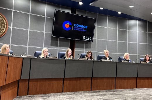 board members at a dais