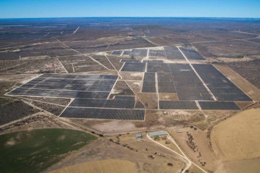 An aerial shot of the area where the solar farm will be built is shown.