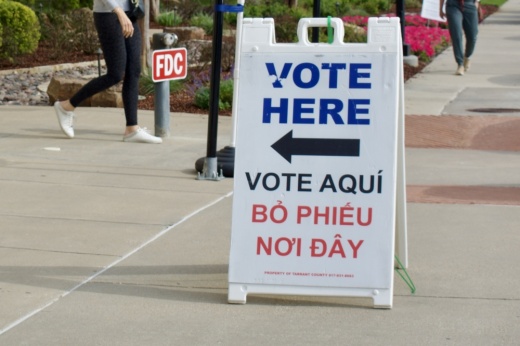 a vote here sign for a polling location
