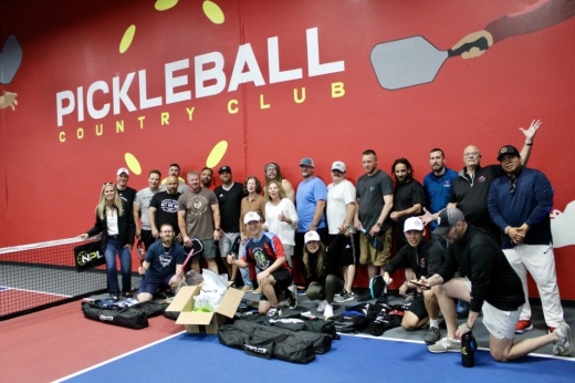 group photo with vets and The Houston Hammers