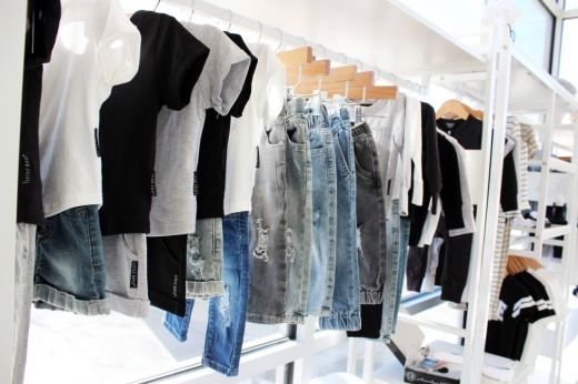 Short sleeved t-shirts in black, white and gray and denim items.
