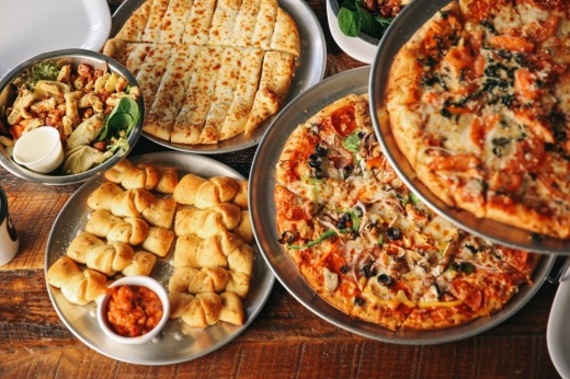 Crust Pizza Co. sells pizzas, salads, pasta, sandwiches and appetizers. (Courtesy Crust Pizza Co.)
