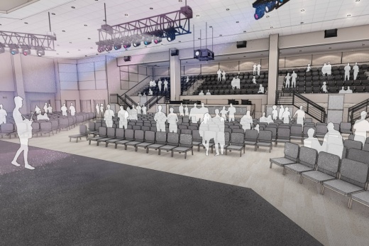 Rendering of a stage with a person holding a guitar on a stage with audience members in riser seating.