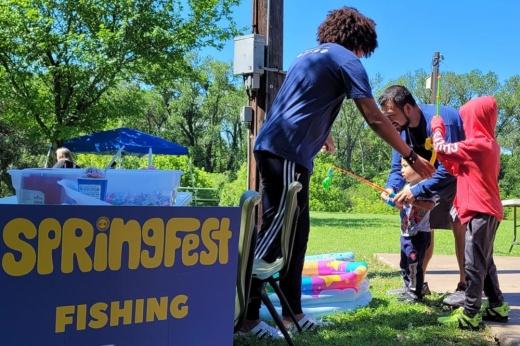Children fish in pool during a previous Springfest.