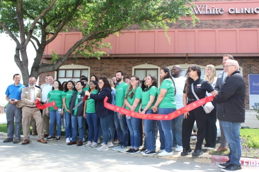 The Hutto Area Chamber of Commerce cut a ribbon for the expansion of the Baylor Scott & White clinic in Hutto. (Grant Crawford/Community Impact)