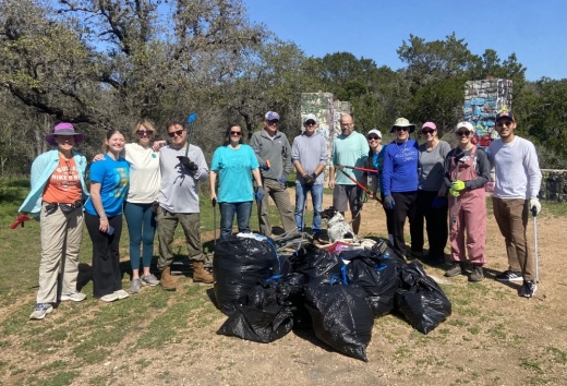 Members of Zilker 351 pose for a photo during a cleanup event. (Courtesy Zilker 351)
