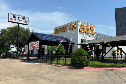 Exterior of building with Nan Hot Pot signage.