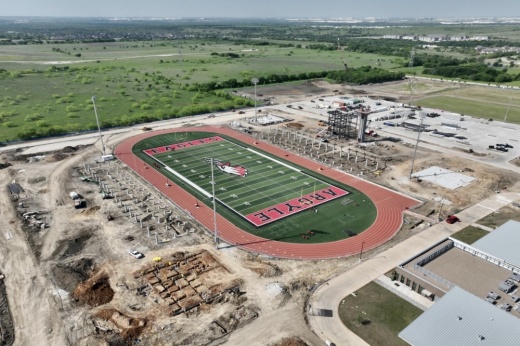 The home side press box steel frame has been erected and crews have begun masonry work around it.