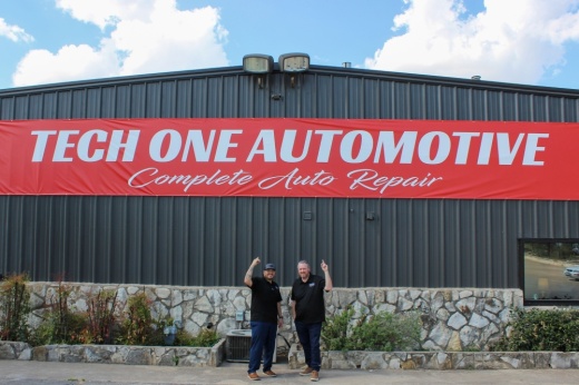 An image of the outside of the location with its banner.