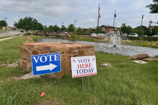 Voting signs in front of the Denton County Southwest Courthouse