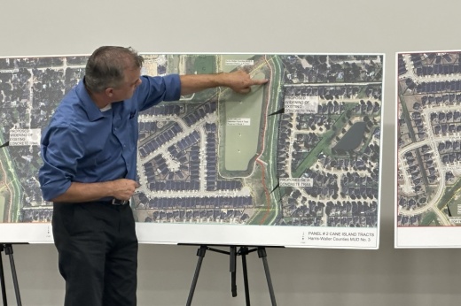 City Engineer David Kasper walks residents through what the citywide trail system could look like at a Sept. 10 open house. (Aubrey Vogel/Community Impact)