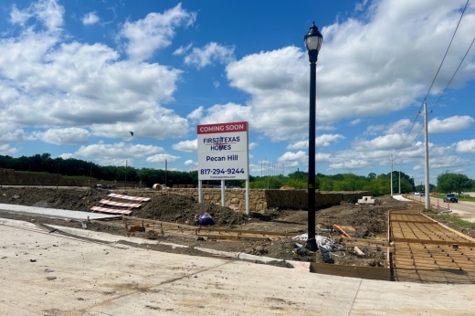 Sign and site under construction