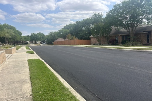 A new layer of pavement is seen on a neighborhood street in Schertz, Texas.