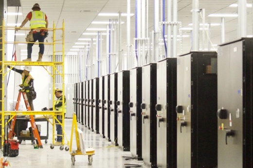 Construction workers prepare one of the server rooms inside Sabey Data Centers in Round Rock.