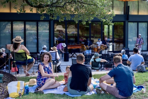 People listening to live music in the park