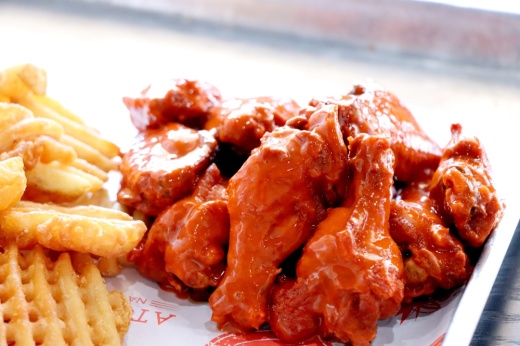 Atomic Wings officials plan to open nine more locations in the Houston area through 2026 as part of its regional expansion. (Courtesy Atomic Wings)