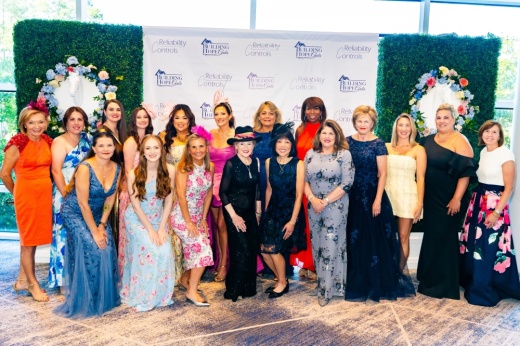 row of women in gowns