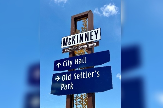 Image of McKinney Wayfinding sign that lists City Hall and Old Settler's Park