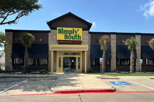 Exterior of building with Simply South signage.
