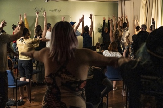 Stand-Up Comedy, Sit Down Yoga takes place at rotating yoga studios in Austin. (Courtesy Stand-Up Comedy, Sit Down Yoga)