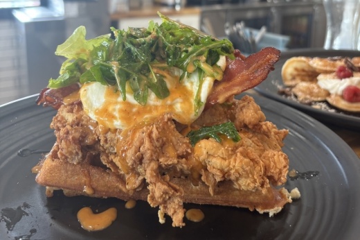 The Southern Chicken Waffle Sandwich is one of many gourmet items served at Wafflelicious. (Andrew Creelman/Community Impact)