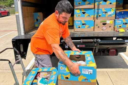 Anthony Chavez, Bastrop County Emergency Food Pantry inventory clerk, unloads food donations that were distributed to local residents in need. (Courtesy Bastrop County Emergency Food Pantry)
