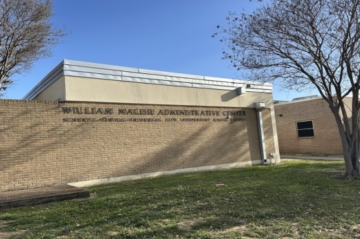 The exterior of a school district administration building in Schertz, Texas is shown.