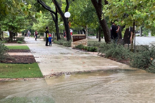 Flood waters cover Heritage Trail in Round Rock July 5. (Amy Bryant/Community Impact)