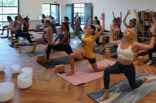 people doing yoga poses