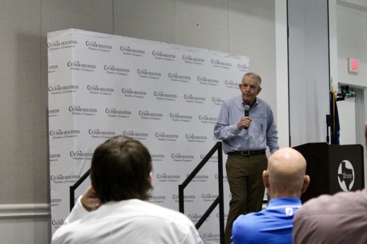 Jim McIngvale speaks on a stage