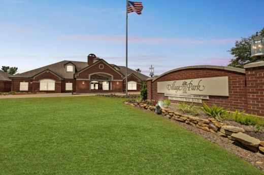 The front of Village on the Park's main building.