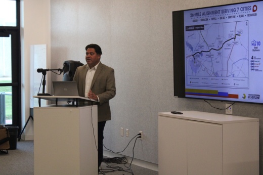 A man speaking at a podium