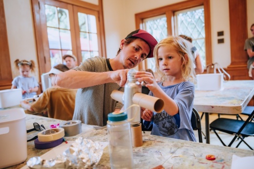 An image of a child building something.