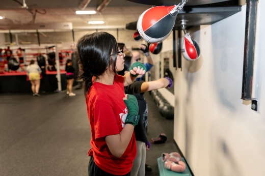 An image of a student boxing.