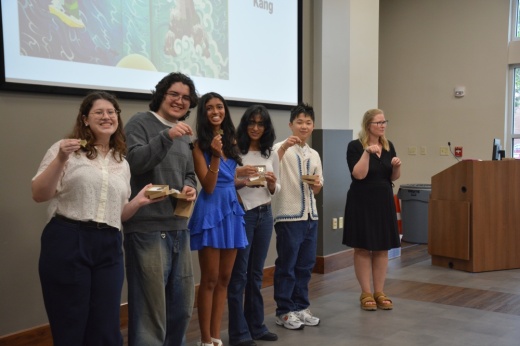 Library officials gave commemorative key chains to five Flower Mound High School students who painted murals within five study rooms. The students are, from left, Abbie Sweatt, Gael Giovani Guardado, Rhianna Patel, Soun Reddy and Noah Kang.