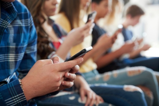 students on smartphones